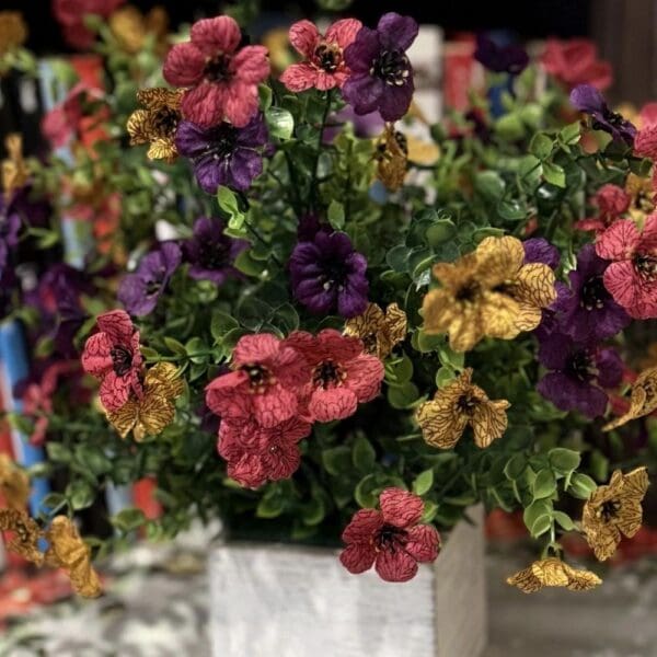 Mixed flowers with lush greenery