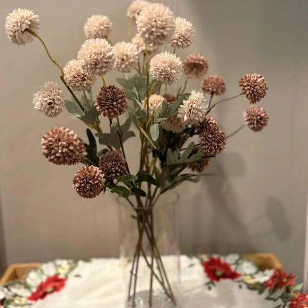 Pink pom-pom flowers in vase
