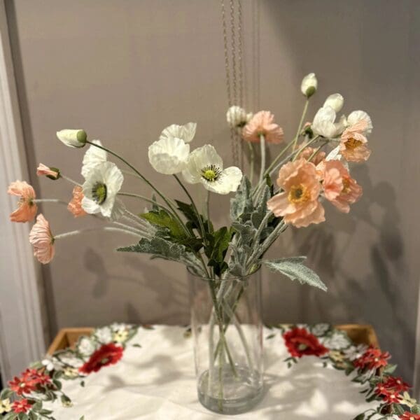 Delicate flowers in a glass vase