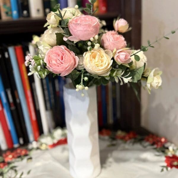 Pink and white roses on tablecloth
