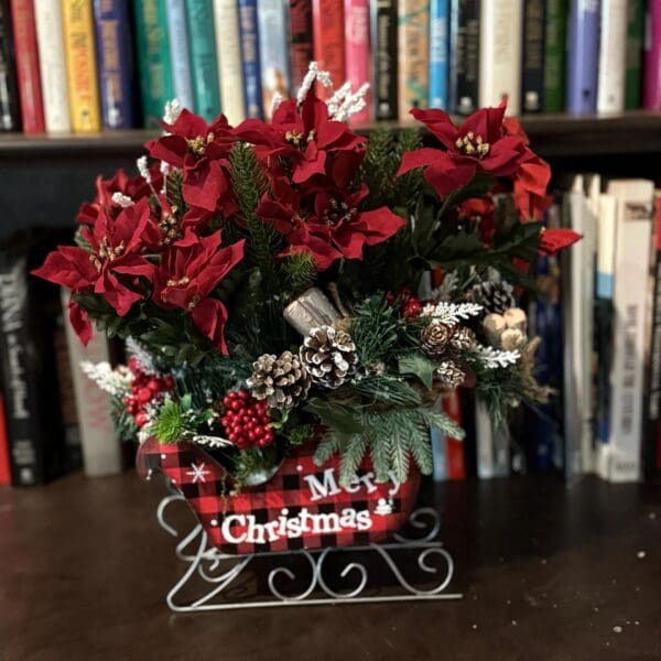 Christmas floral arrangement with red poinsettias