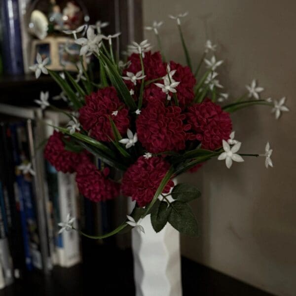Red and white flowers in vase