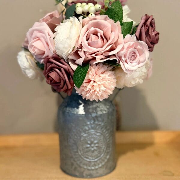 Elegant floral arrangement in rustic vase