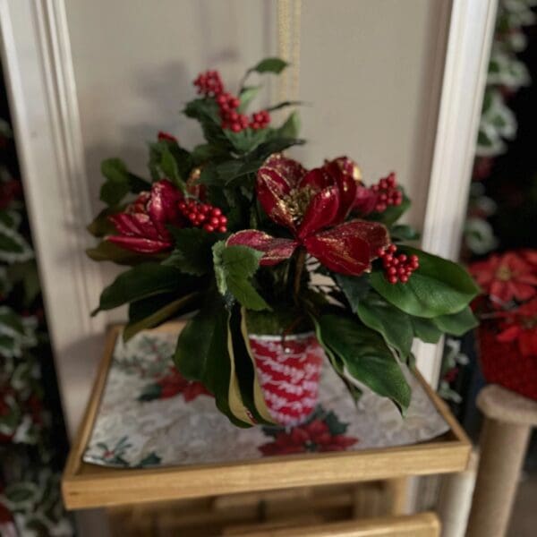 Festive floral arrangement with red accents