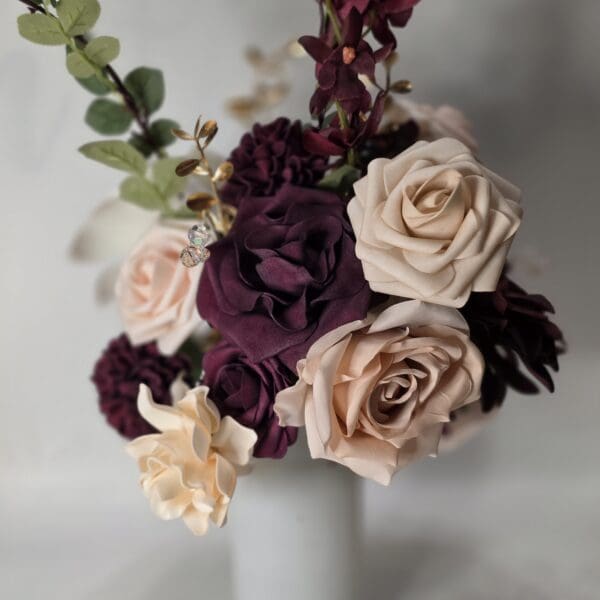 Bouquet of mixed roses in a vase.