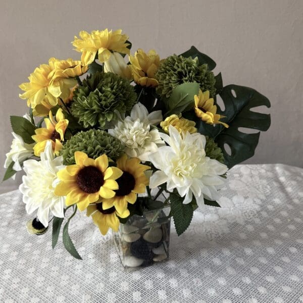 Yellow and white bouquet in vase