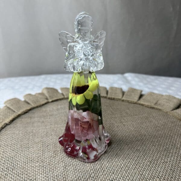 RESIN ANGEL W/FLOWERS